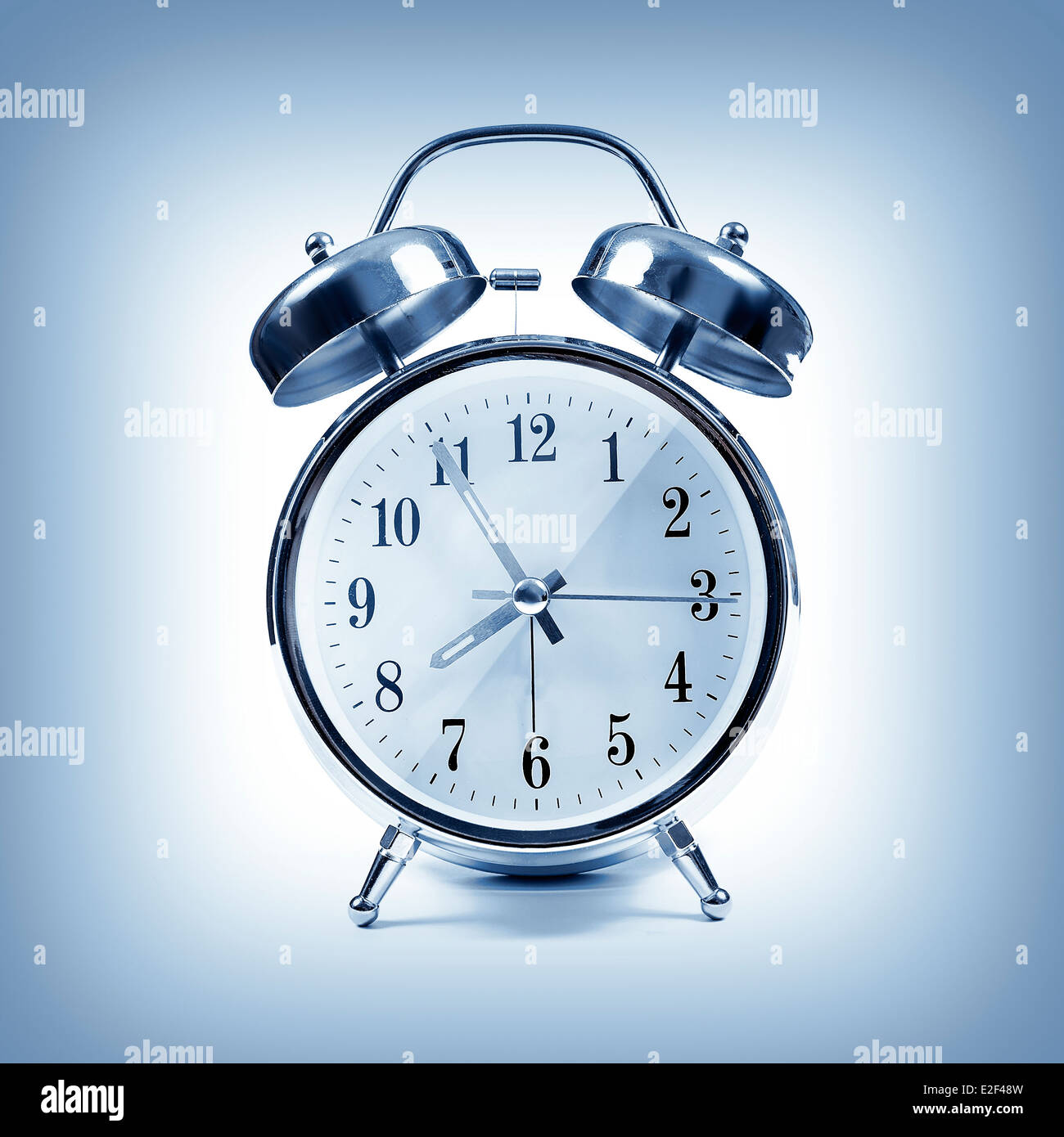 Alarm clock isolated on a white background Stock Photo - Alamy