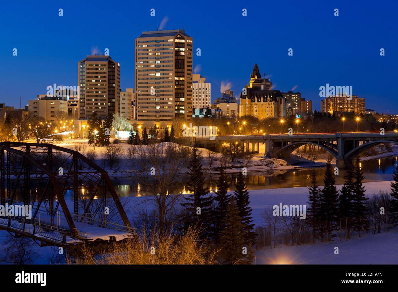 Canada, Saskatchewan, Saskatoon, downtown at dusk from the South Saskatchewan River banks in winter Stock Photo