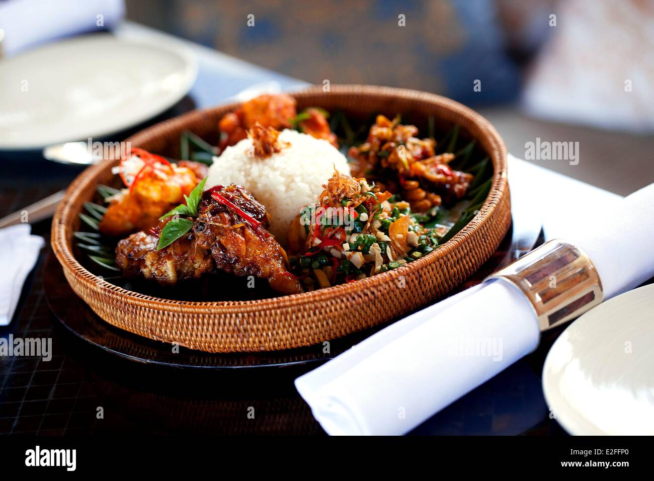 Indonesia Bali Manggis Amankila Hotel restaurant Nasi Campur (Indonesian Tasting Plate) Ayam Goreng Ketchup Manis which is Stock Photo