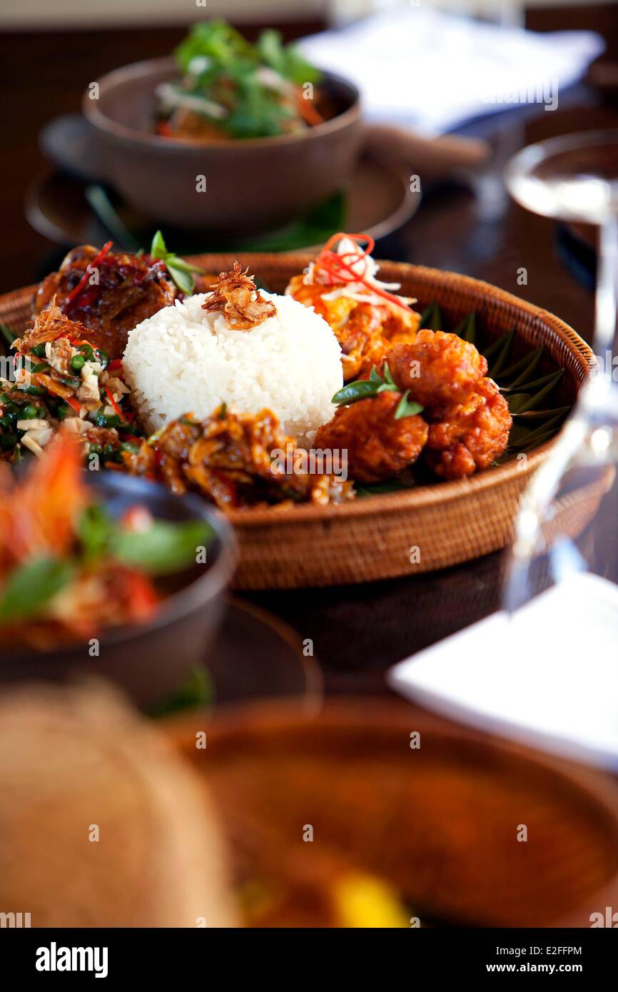 Indonesia Bali Manggis Amankila Hotel restaurant Nasi Campur (Indonesian Tasting Plate) Ayam Goreng Ketchup Manis which is Stock Photo