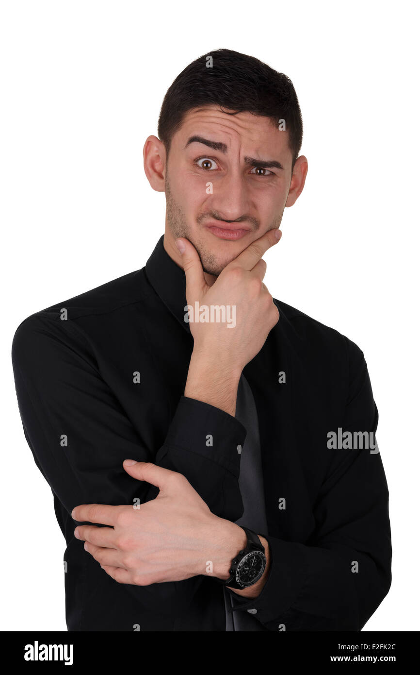 Funny Expression of a Young Man Thinking Stock Photo