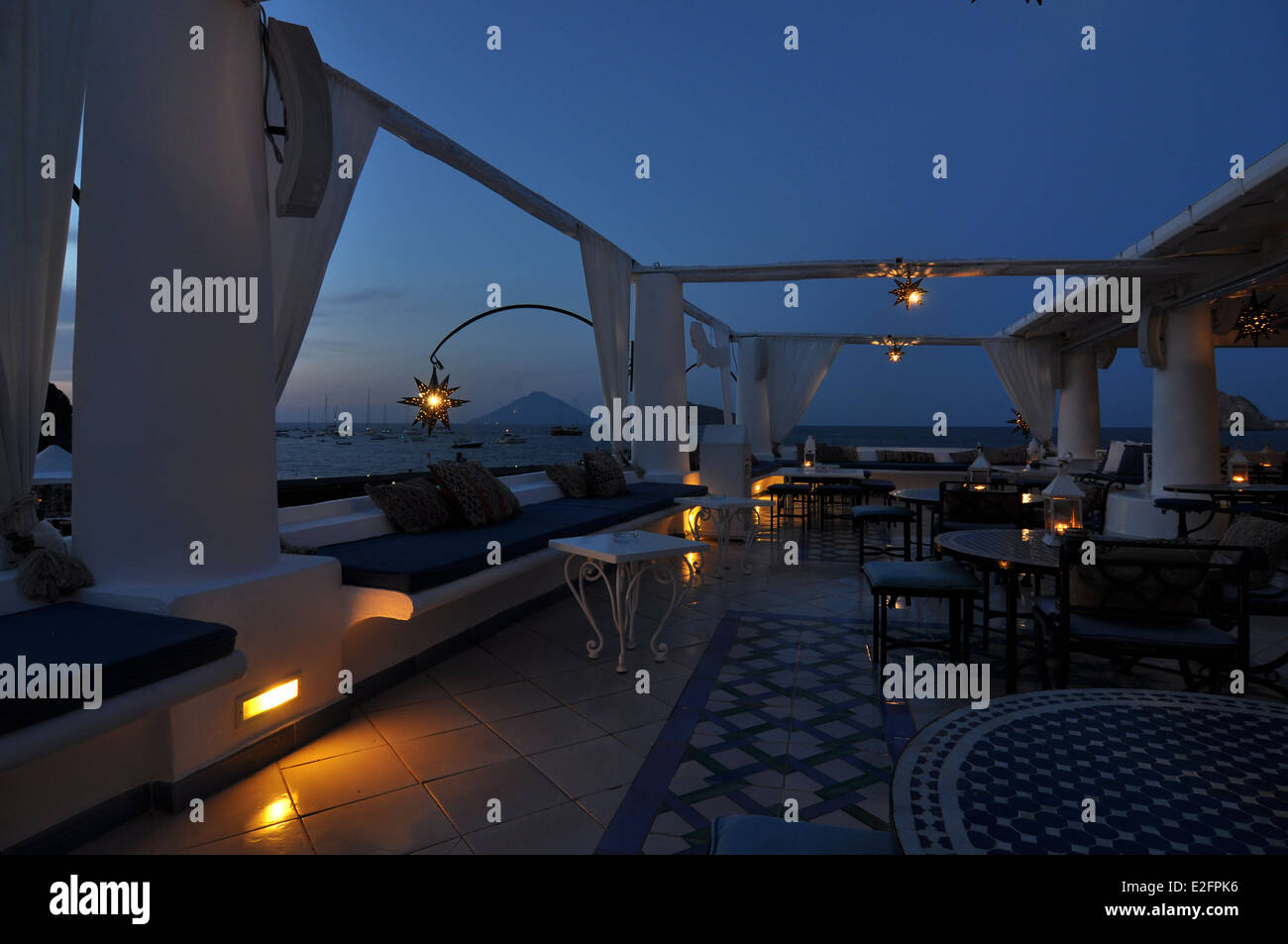 Panarea sunset 'Lisca Bianca terrace' and view to Stromboli Stock Photo