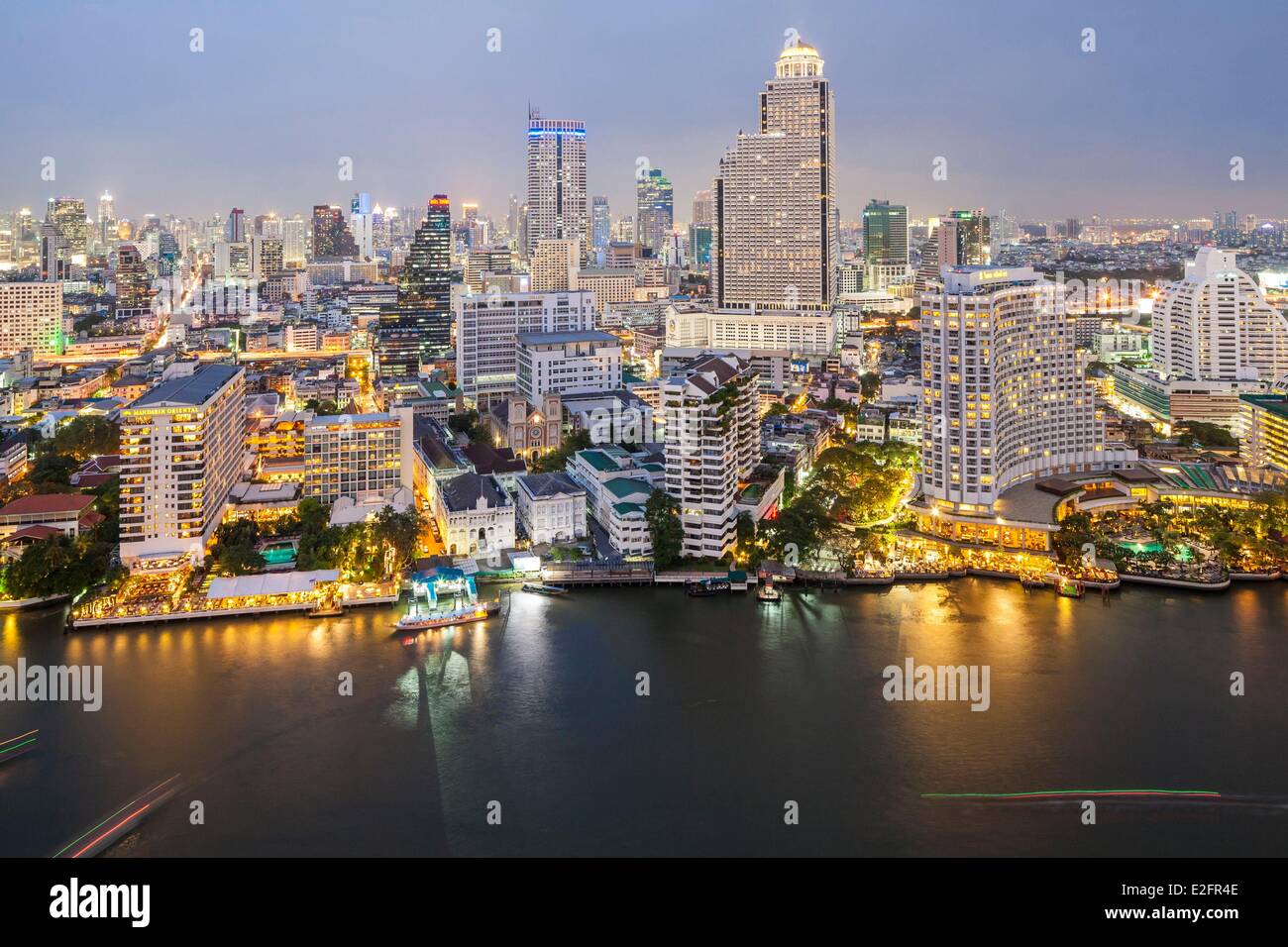 Thailand Bangkok banks of the Chao Phraya river view from the Peninsula Hotel in Bang Rak district with Mandarin Oriental and Stock Photo