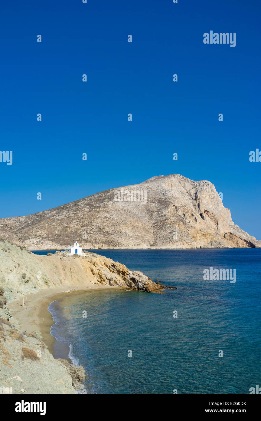 Greece Cyclades Islands Anafi Island beach and church Agii Anargyri Kalamos rock in the background Stock Photo