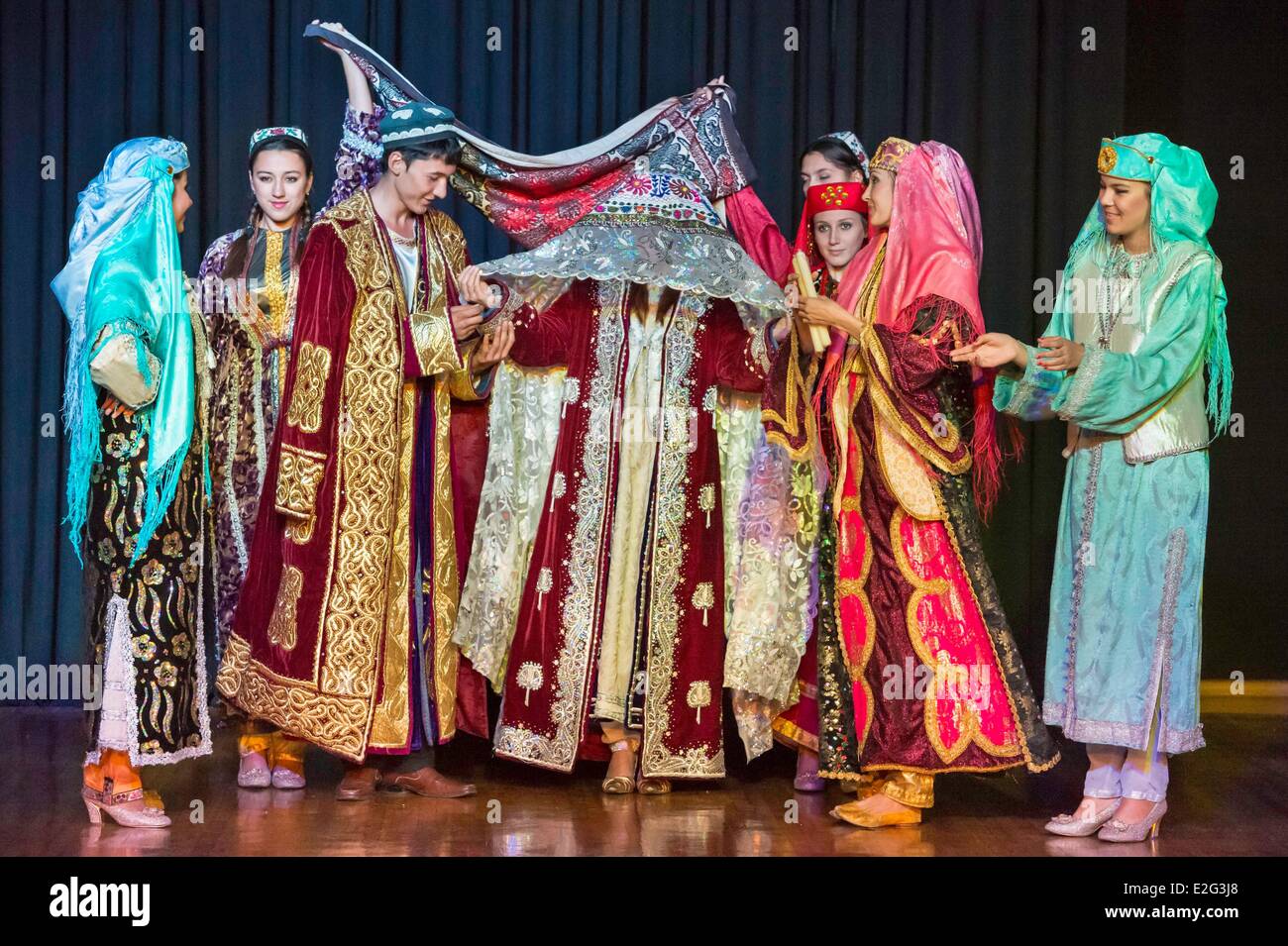 Uzbekistan Silk Road Samarkand listed as World Heritage by UNESCO El Merosi theater show of traditional dances and costumes of Stock Photo