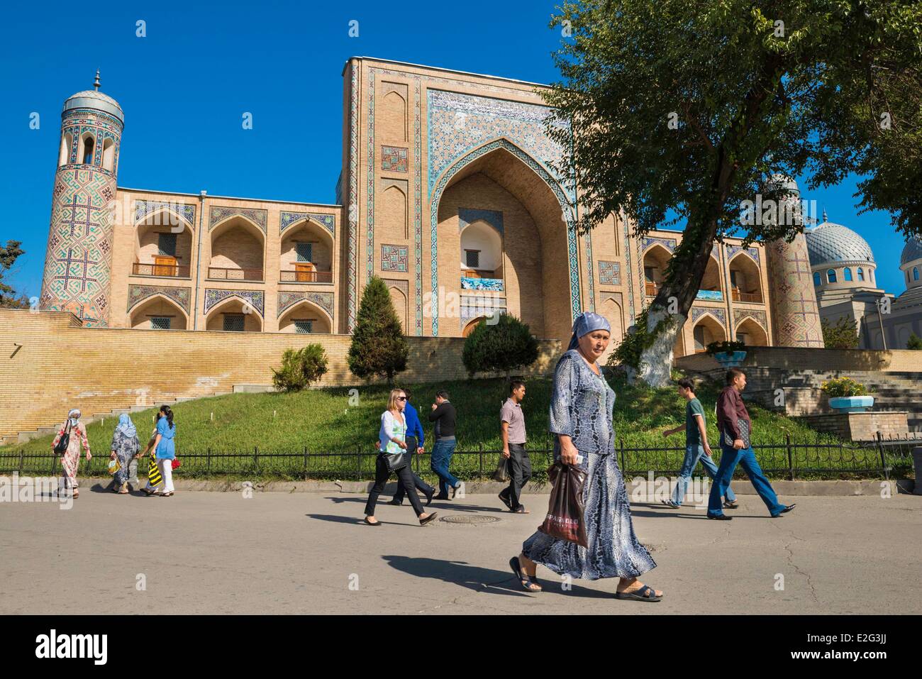 Uzbekistan Silk Road Tashkent walking people in front of the Koukeldach Madrasah Stock Photo