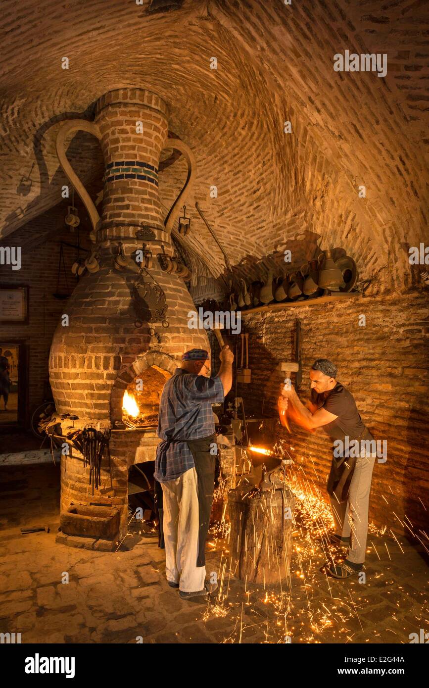 Uzbekistan Silk Road Bukhara historical center listed as world heritage by UNESCO Usto Shokir and Shavqiddin two blacksmiths Stock Photo