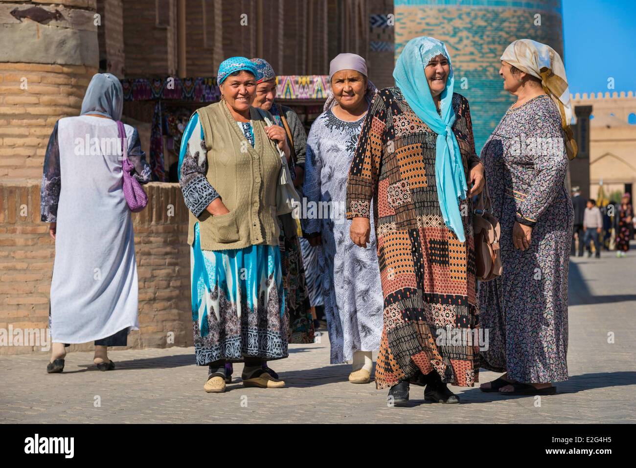 Uzbekistan Silk Road Khorezm province Khiva Itchan Kala protected city listed as world heritage by UNESCO walking people in Stock Photo