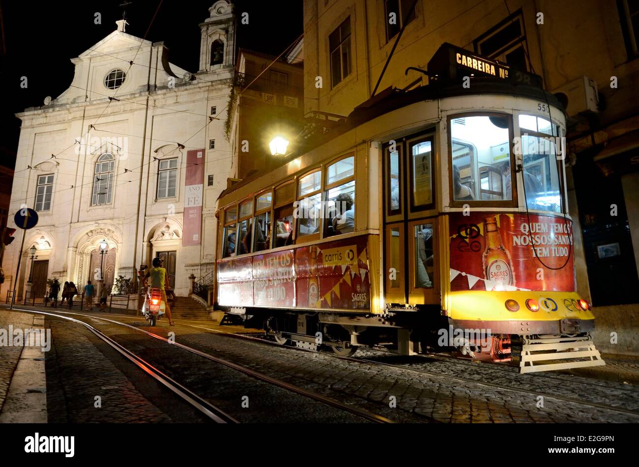 Portugal Lisbon Baixa pombalin district tram in the rua da Conceicao at night Stock Photo