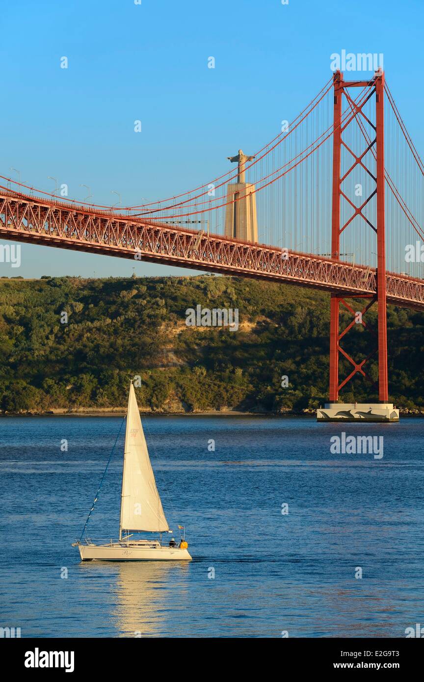 Portugal Lisbon 25 de Abril bridge on Tagus river and the Cristo Rei (Christ the King) Stock Photo