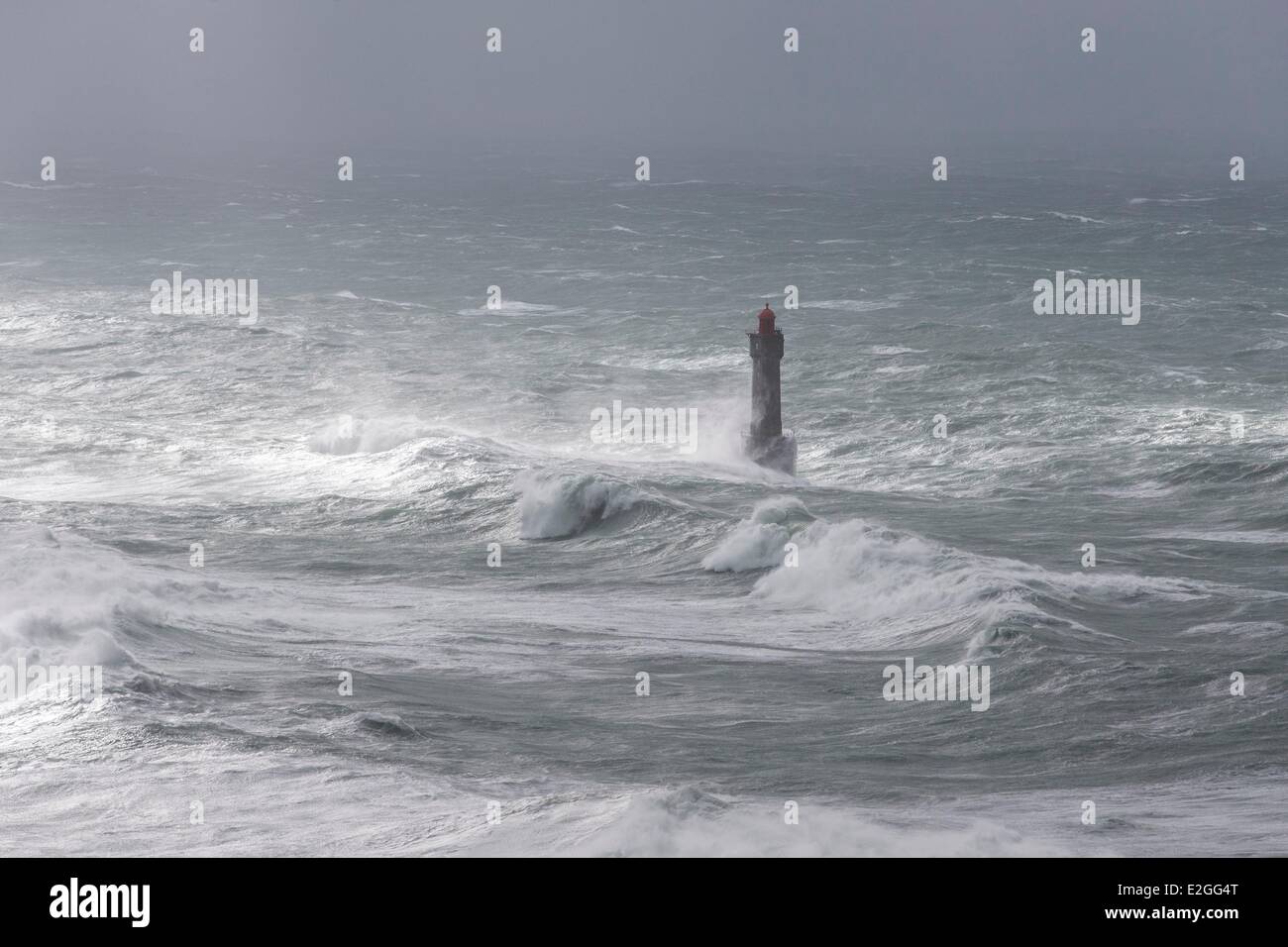 France Finistere Ile d'Ouessant February 8th 2014 Britain lighthouse in stormy weather during storm Ruth Jument Lighthouse Pern headland (aerial view) Stock Photo