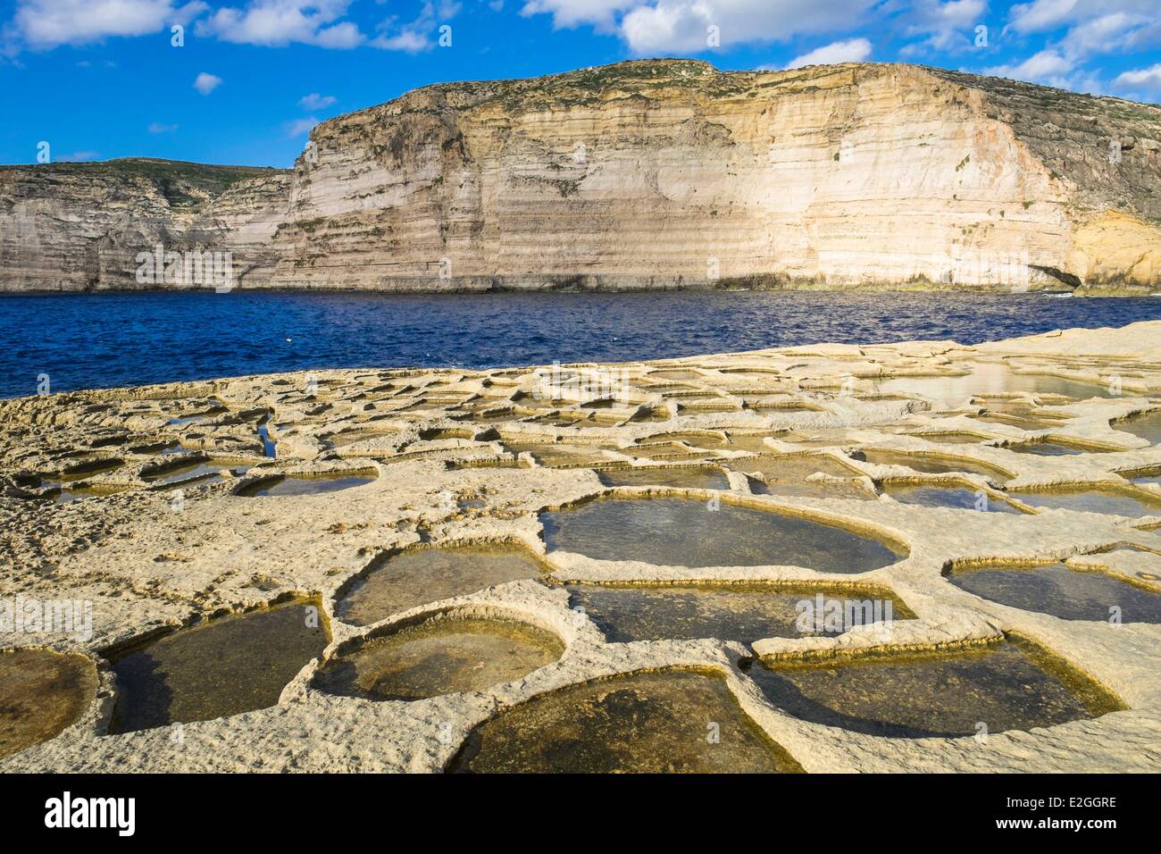 Malta Gozo island Xlendi salt pans in Xlendi bay Stock Photo Alamy