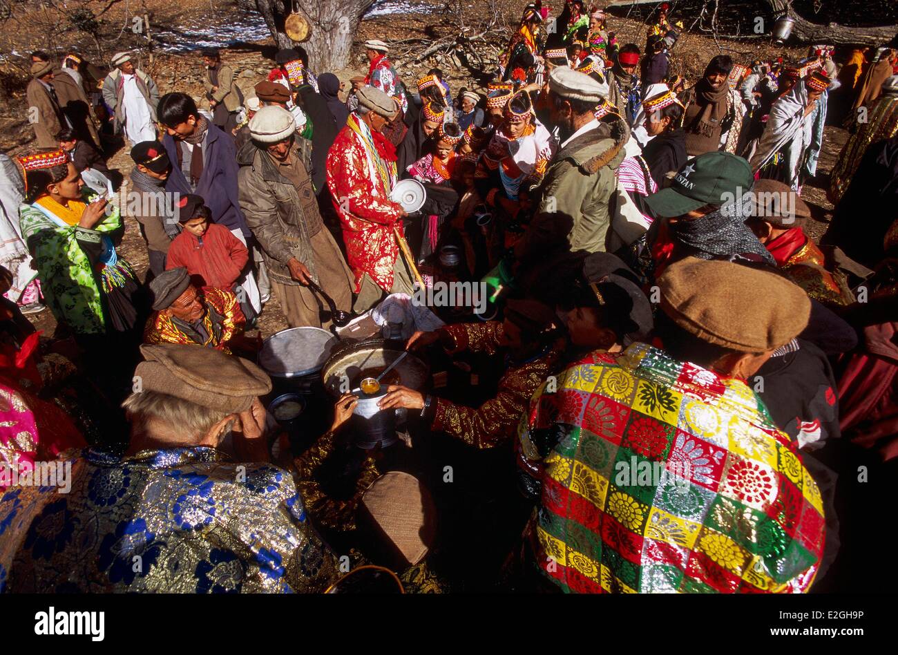 Pakistan Khyber Pakhtunkhwa Kalash valleys Rumbur valley collective meal of Han Salik collective meal of Han Salik meal offered by a village at all Kalash of three valleys during inauguration of a Jestak Han house of lineages Stock Photo