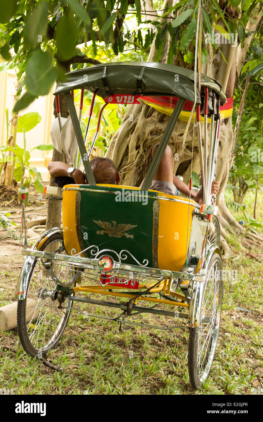 old man resting on tricycle Stock Photo Alamy