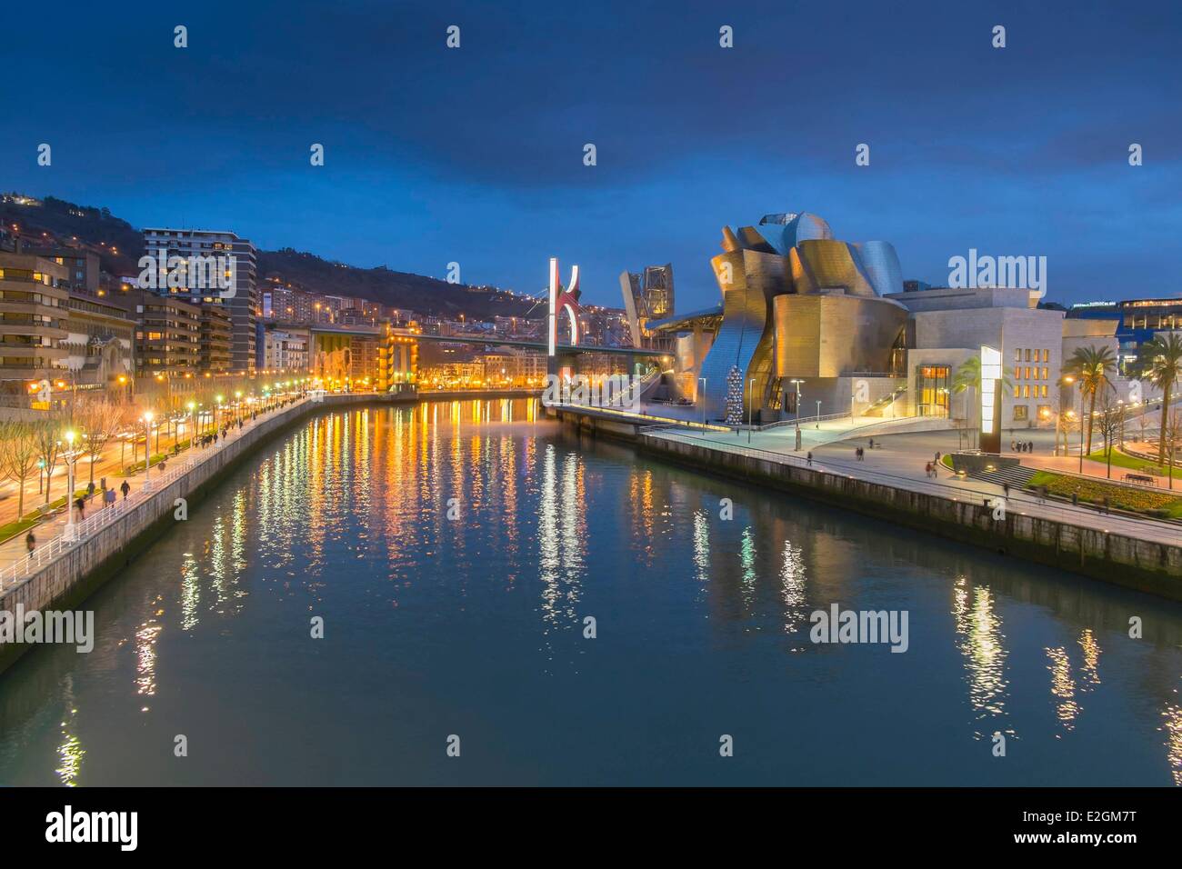 Spain Basque Country Region Vizcaya Province Bilbao Guggenheim Museum by architect Frank Gehry and Salve bridge with Les Arches Rouges artpiece by French artist Daniel Buren Stock Photo