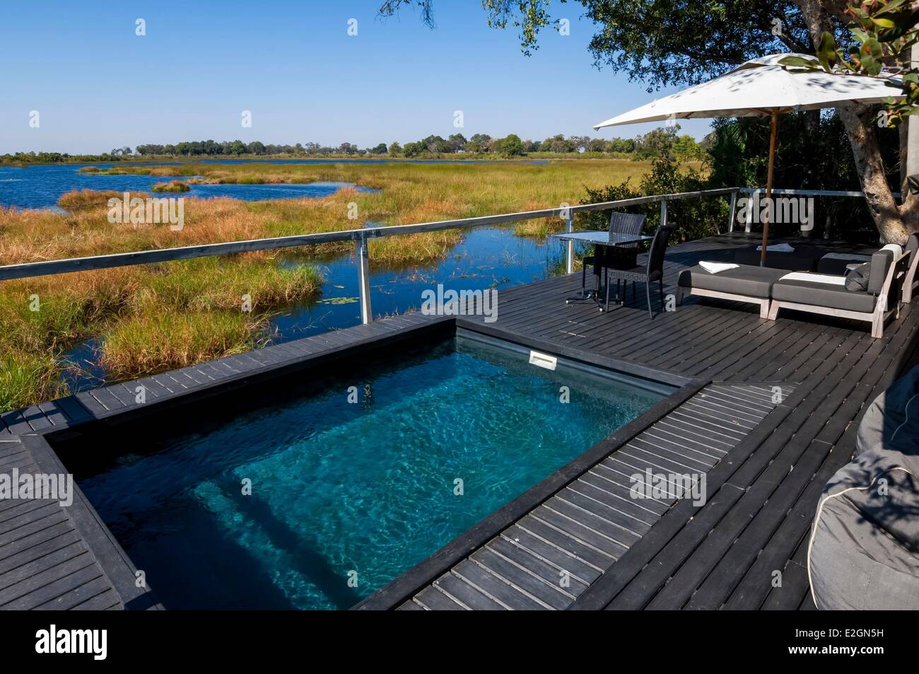 Botswana North West District Okavango Delta Abu Lodge luxury bungalows outdoor deck with private pool Stock Photo