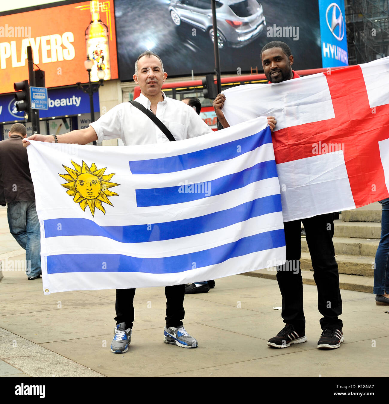 London, UK. 19th June, 2014. Fans from England, Uruguay and Colombia supporting their national team in Piccadilly Circus, London, UK 19th June 2014 Credit:  Giulia Fiori/Alamy Live News Stock Photo