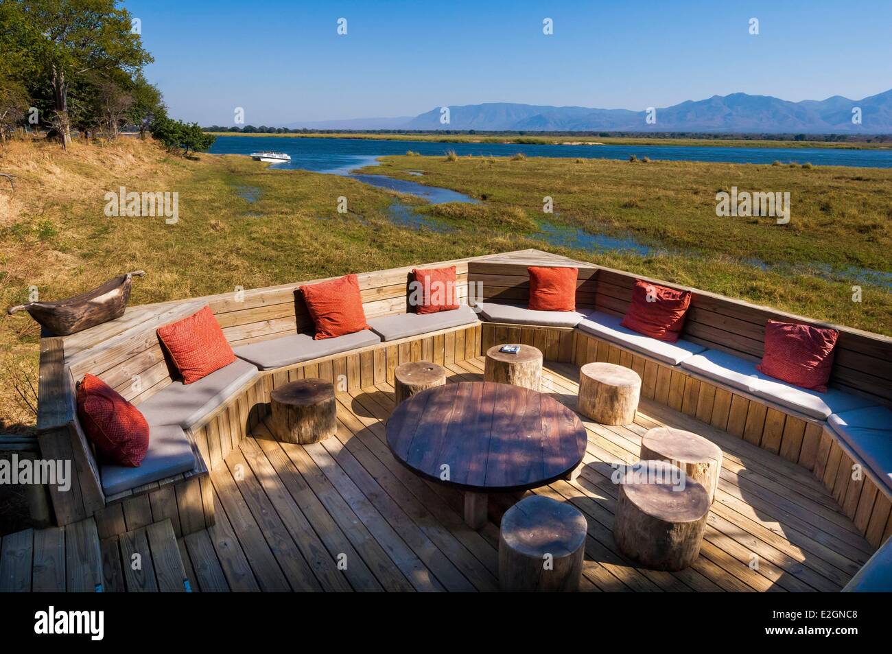 Zimbabwe Mashonaland West Province Mana Pools National Park listed as World Heritage by UNESCO Ruckomechi camp boma or gathering space by fire overlooking Zambezi river Stock Photo