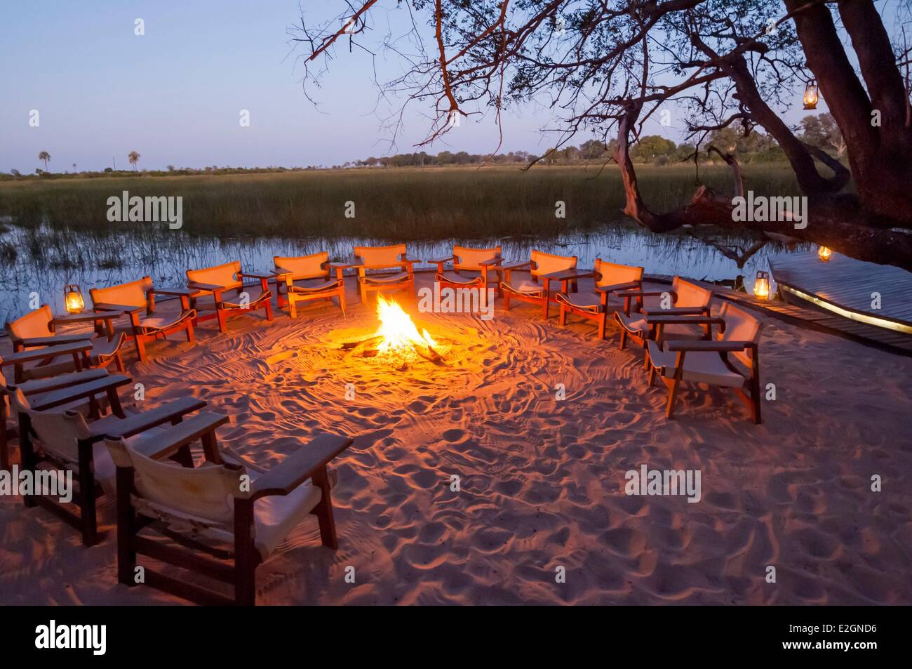 Botswana North West District Okavango Delta Abu Lodge boma or outdoor gathering place by fire Stock Photo