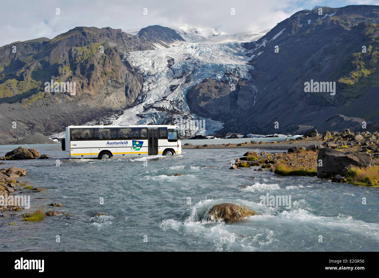 Iceland bus crossing a river close to Thorsmork Landmannalaugar trekking Stock Photo
