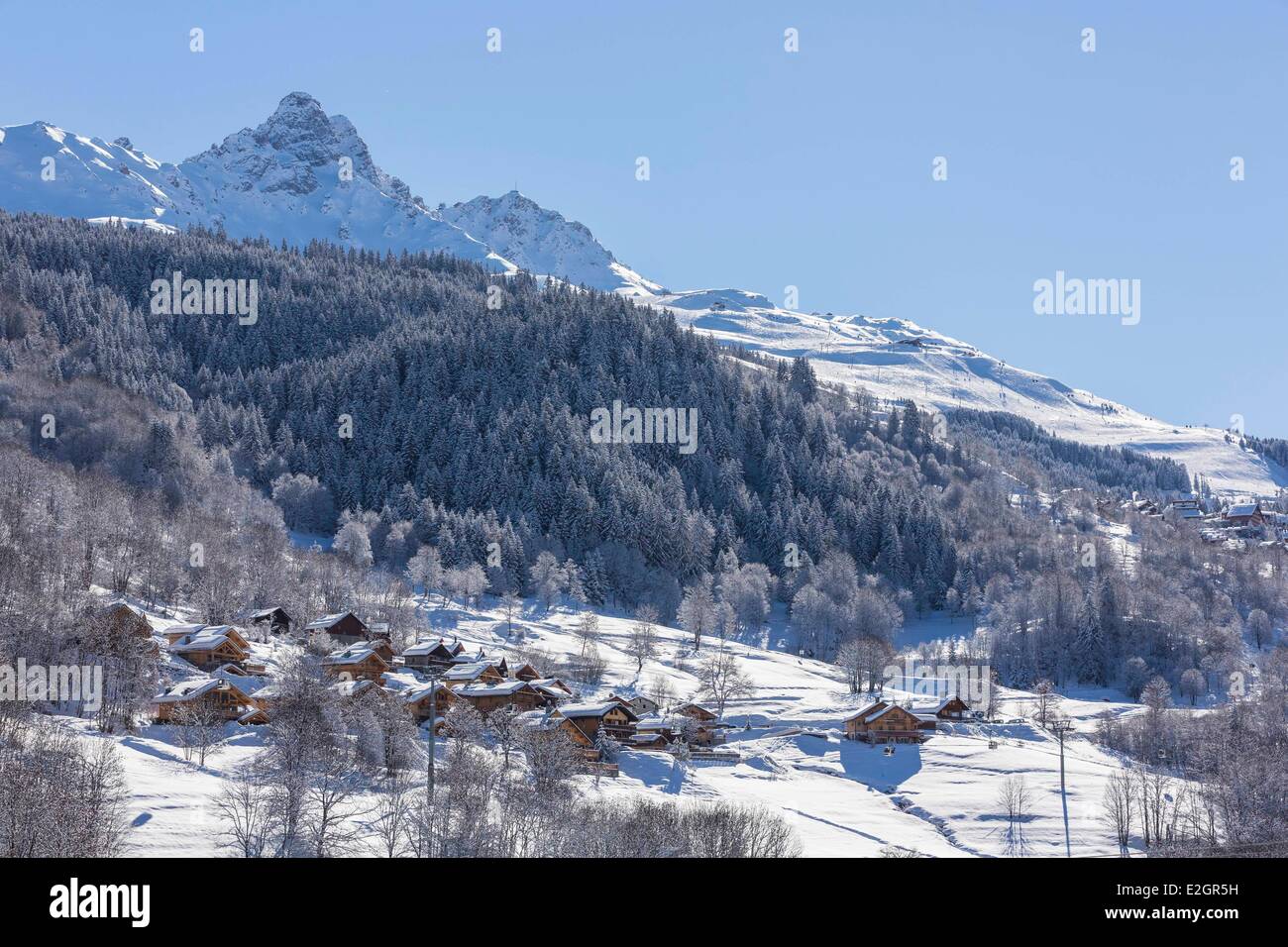 France Savoie Tarentaise valley Meribel-Les Allues hamlet of La Giettaz with a view of Dent De Burgin or Croix de Verdon (2739m) one of largest ski resort village in France in heart of Les Trois Vallees (The Three Valleys) one of biggest ski areas in worl Stock Photo