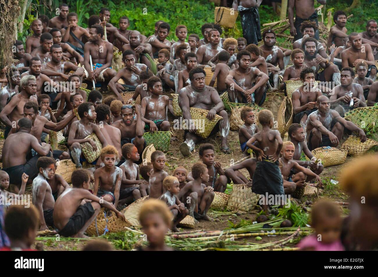 Papua New Guinea Bismarck Archipelago Gazelle peninsula New Britain island East New Britain province Rabaul Tavana village Tolai ceremony consolidation of village for arrival of spirits embodied by an initiate covered leafy called Duk Duk Stock Photo