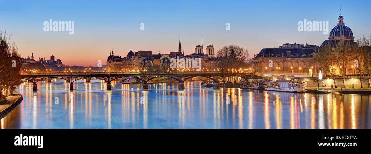 France Paris Seine river banks listed as World Heritage by UNESCO with Arts bridge cupola of Institute of France and City island Stock Photo