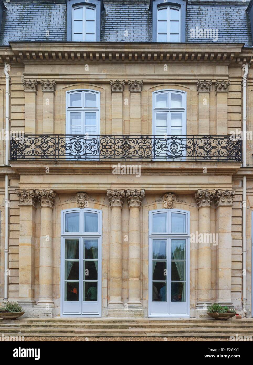 France Paris Rue de Grenelle Hotel de Besenval 18th century Mansion Swiss Ambassy headquarters detail of garden side facade Stock Photo