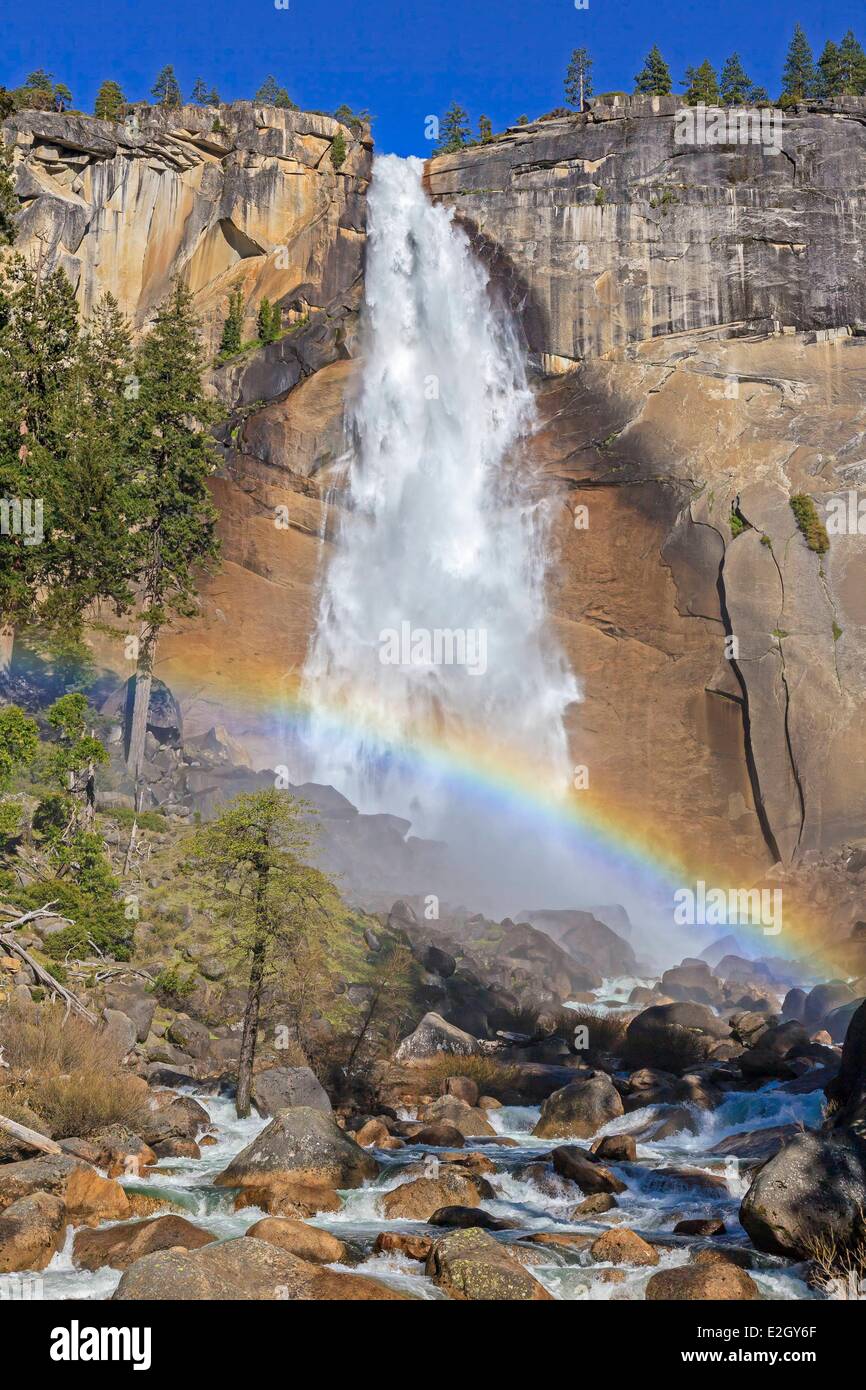 United States California Sierra Nevada Yosemite National Park listed as World Heritage by UNESCO Yosemite Valley Nevada Fall with rainbow Stock Photo