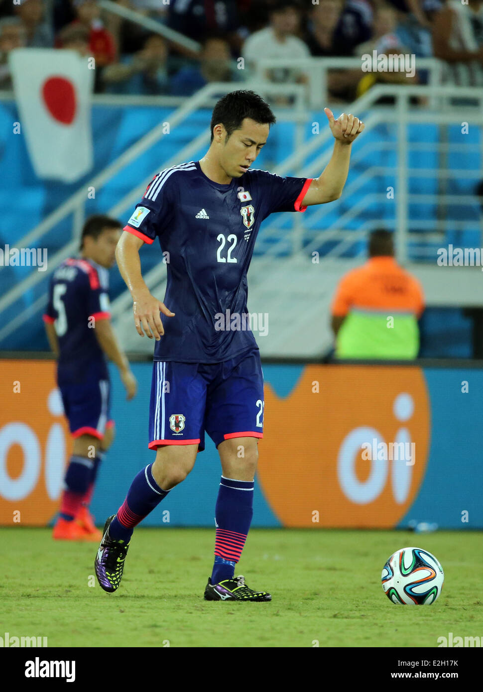 Natal, Brazil. 19th June, 2014. World Cup finals 2014. Group C stage match Japan versus Greece. Yoshida signals position to the referee Credit:  Action Plus Sports/Alamy Live News Stock Photo