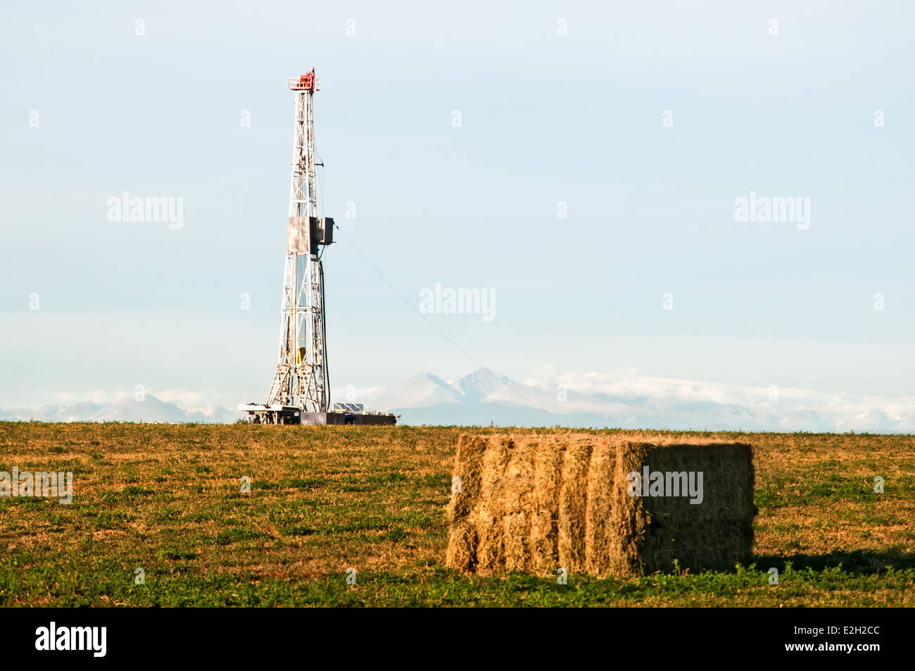 Drilling rig set up in an alfalfa field east of the Rocky Mountains in