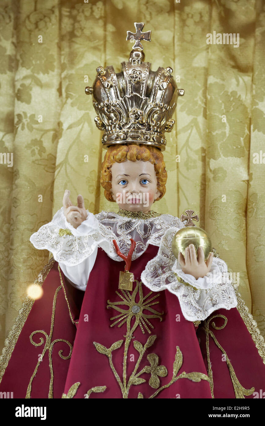 Baby Jesus with crown and orb, children's doll in a Sicilian Baroque church, Palermo, Sicily, Italy Stock Photo