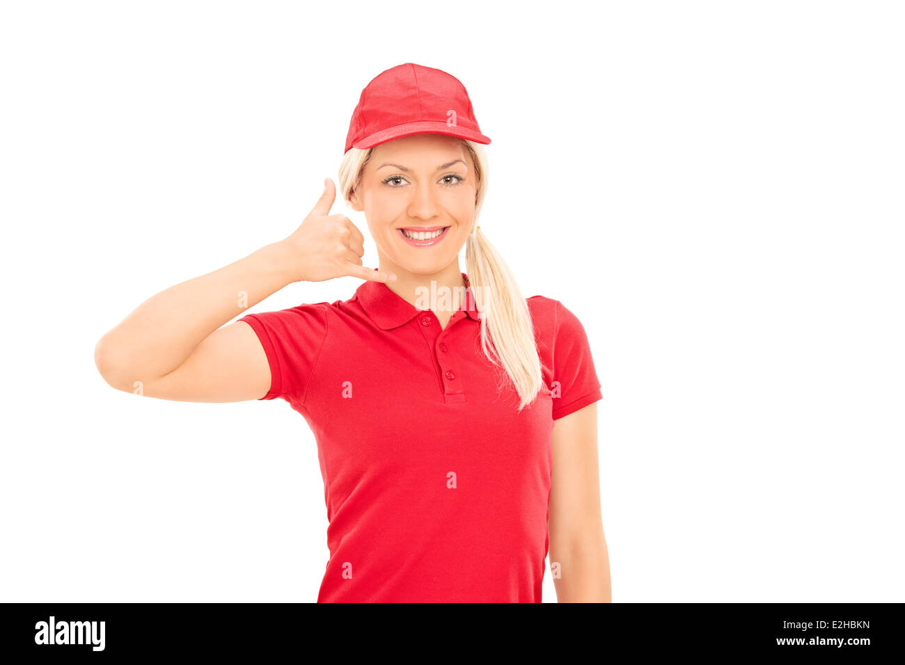 Delivery girl making call sign with her hand Stock Photo