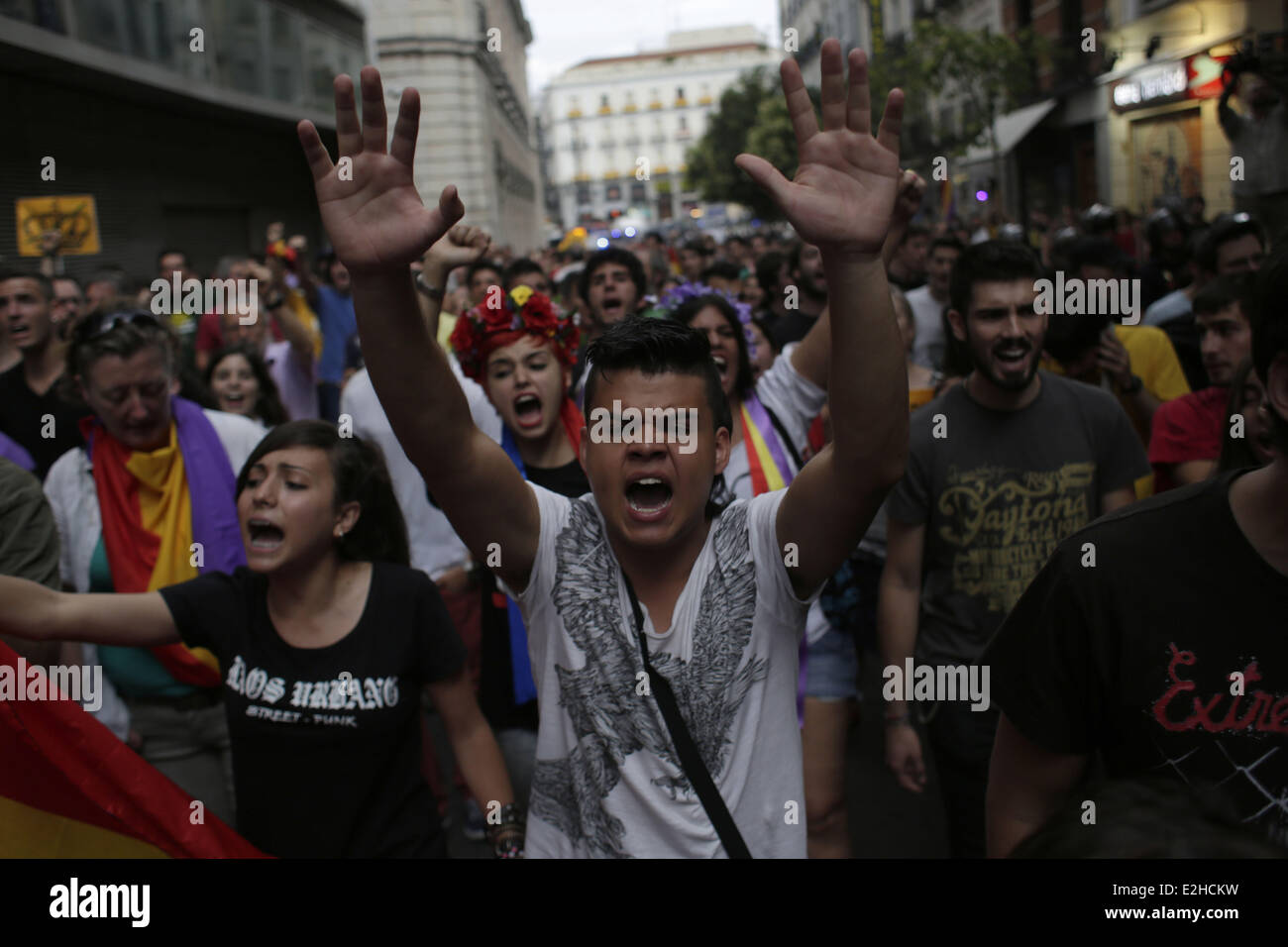 Madrid, Spain. 19th June, 2014. Protestors shout slogans during a demonstration against the Monarchy in Madrid, Spain, Thursday, June 19, 2014. Dozens of protestors gathered in Madrid's main square to protest against the Spanish Monarchy on the day Spain's King Felipe VI was crowned. Credit:  Rodrigo Garcia/NurPhoto/ZUMAPRESS.com/Alamy Live News Stock Photo