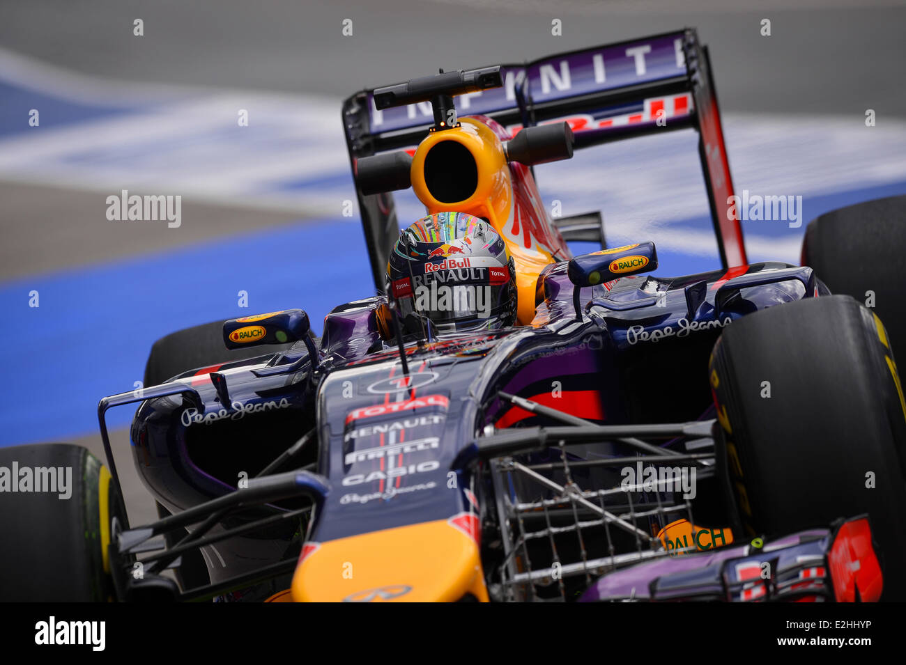 German Formula One driver Sebastian Vettel of Red Bull steers his car ...