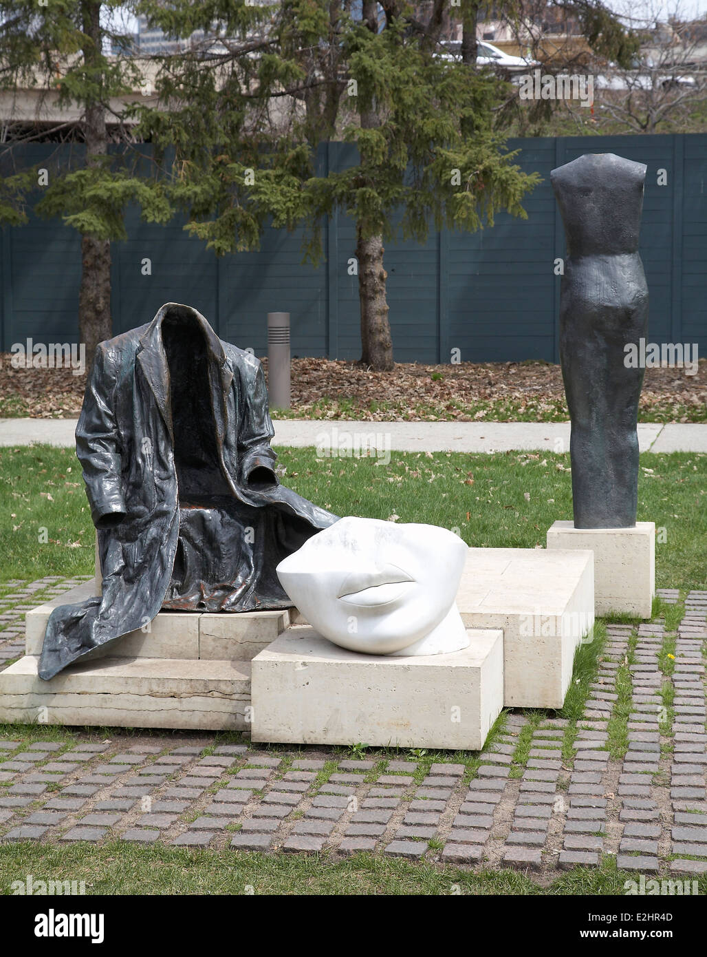 Sculpture by Judith Shea called without words, bronze,marble,limestone