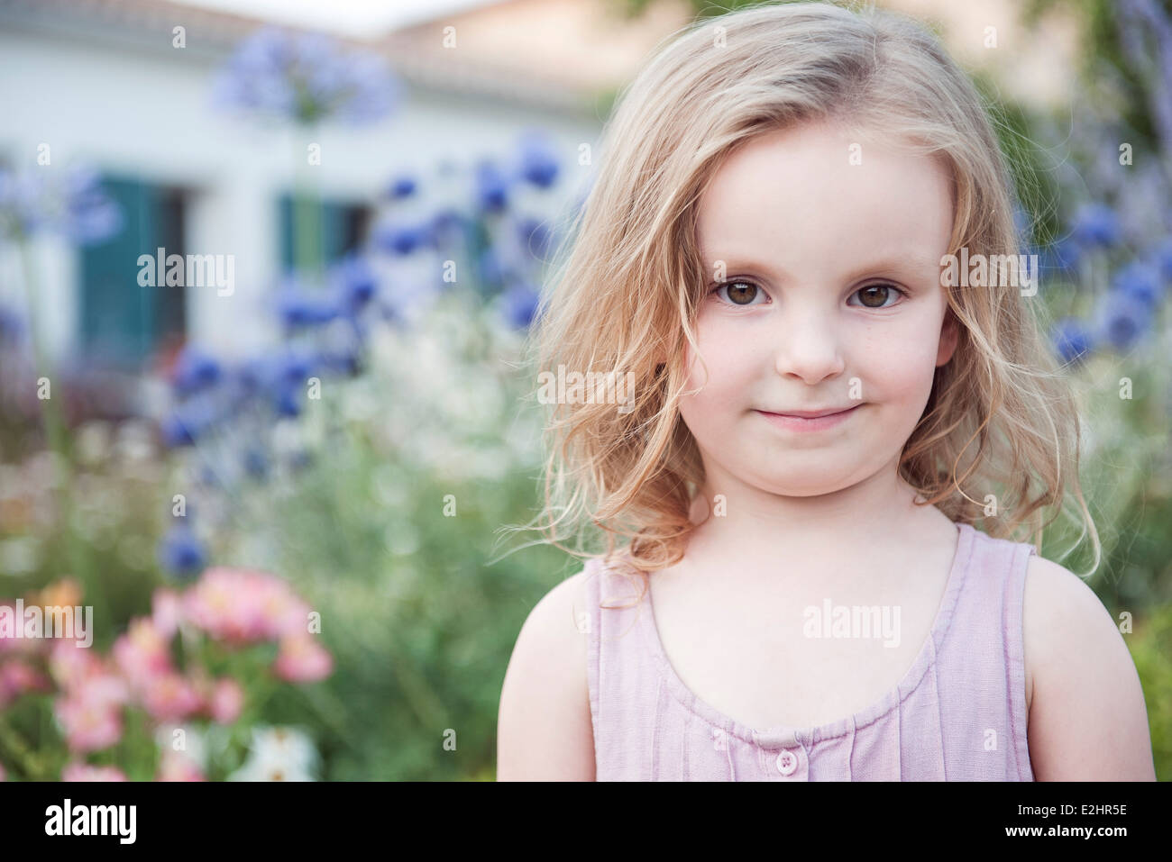 Little girl smiling outdoors, portrait Stock Photo - Alamy