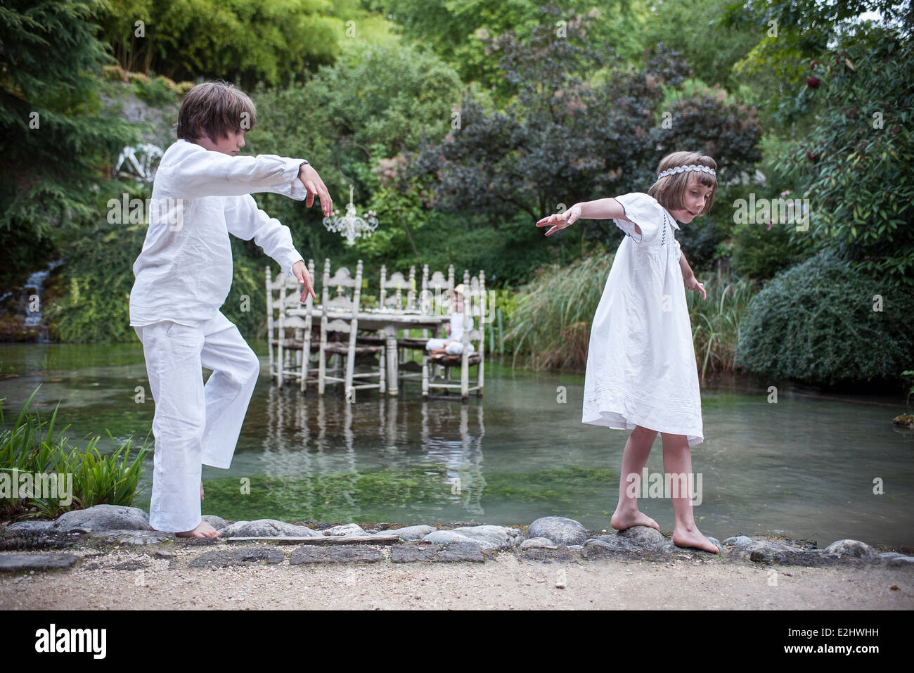 Children Playing Make Believe Outdoors Stock Photo Alamy