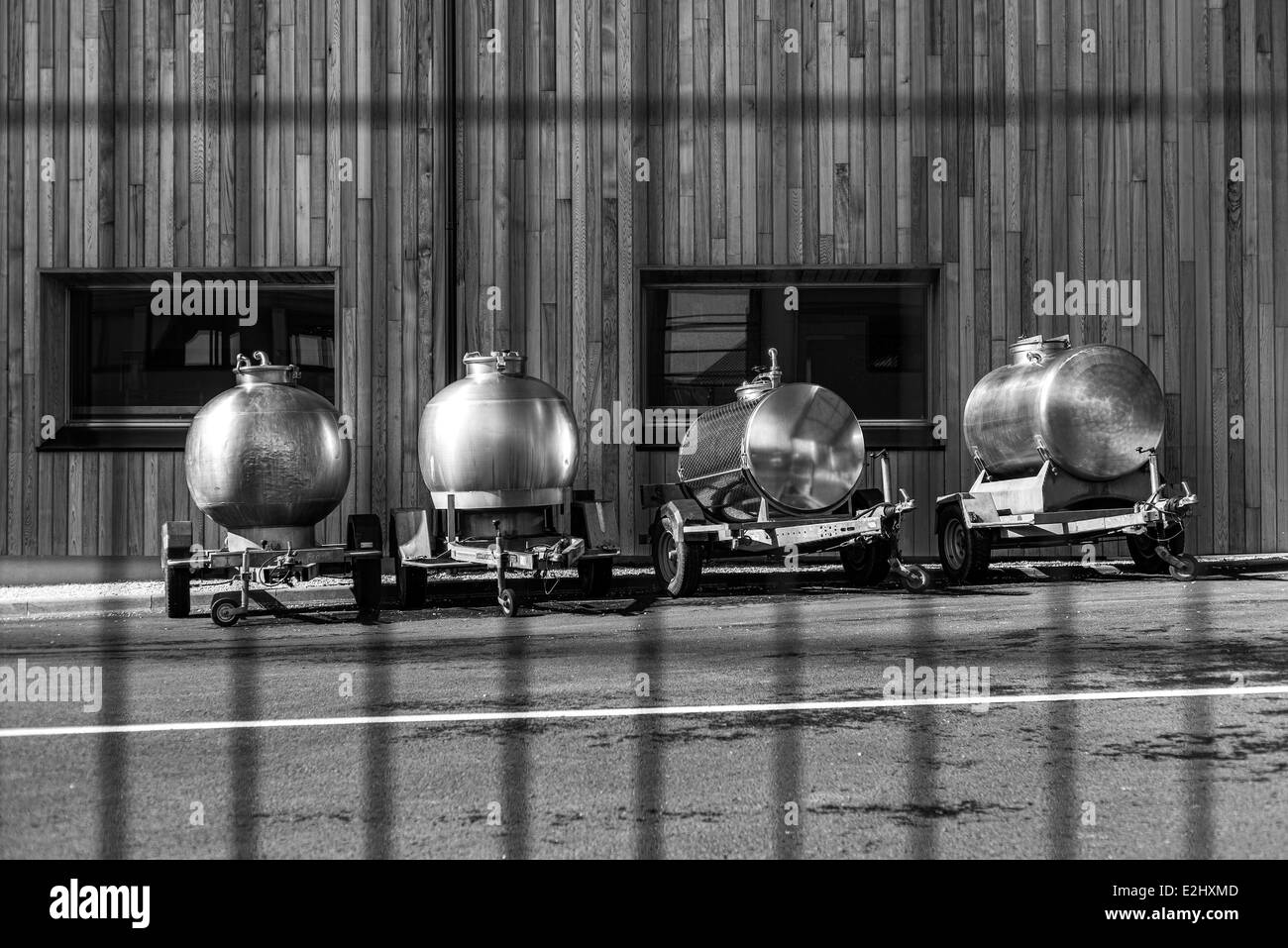 Propane tanks lined up on vehicle trailers, lPornic, Loire-Atlantique, France Stock Photo