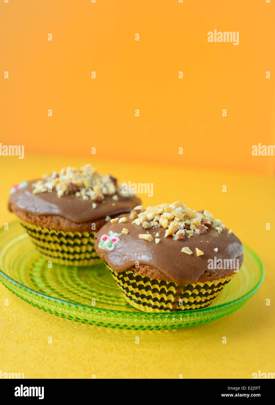 Homemade honey cake, decorated with nuts Stock Photo