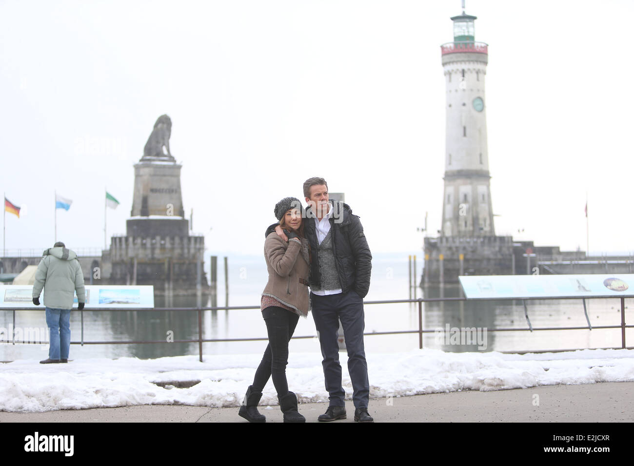 Markus Lanz and girlfriend Angela Gessmann walking along the harbour in Lindau at Bodensee lake. Tonight Markus Lanz hosts the German TV show Wetten dass ... ? in Friedrichshafen.  Where: Lindau, Germany When: 23 Feb 2013 Stock Photo