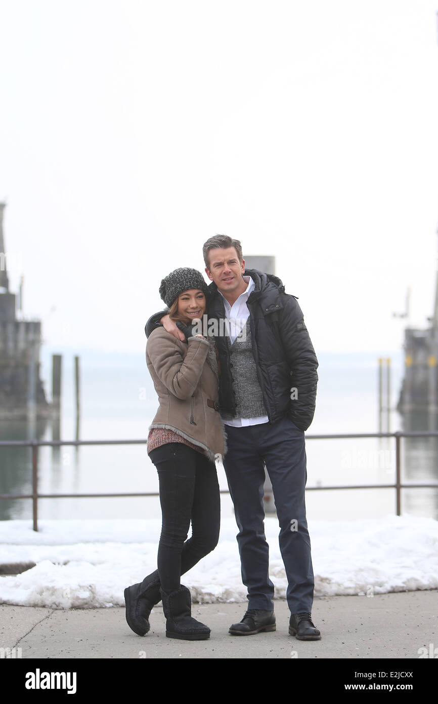 Markus Lanz and girlfriend Angela Gessmann walking along the harbour in Lindau at Bodensee lake. Tonight Markus Lanz hosts the G Stock Photo