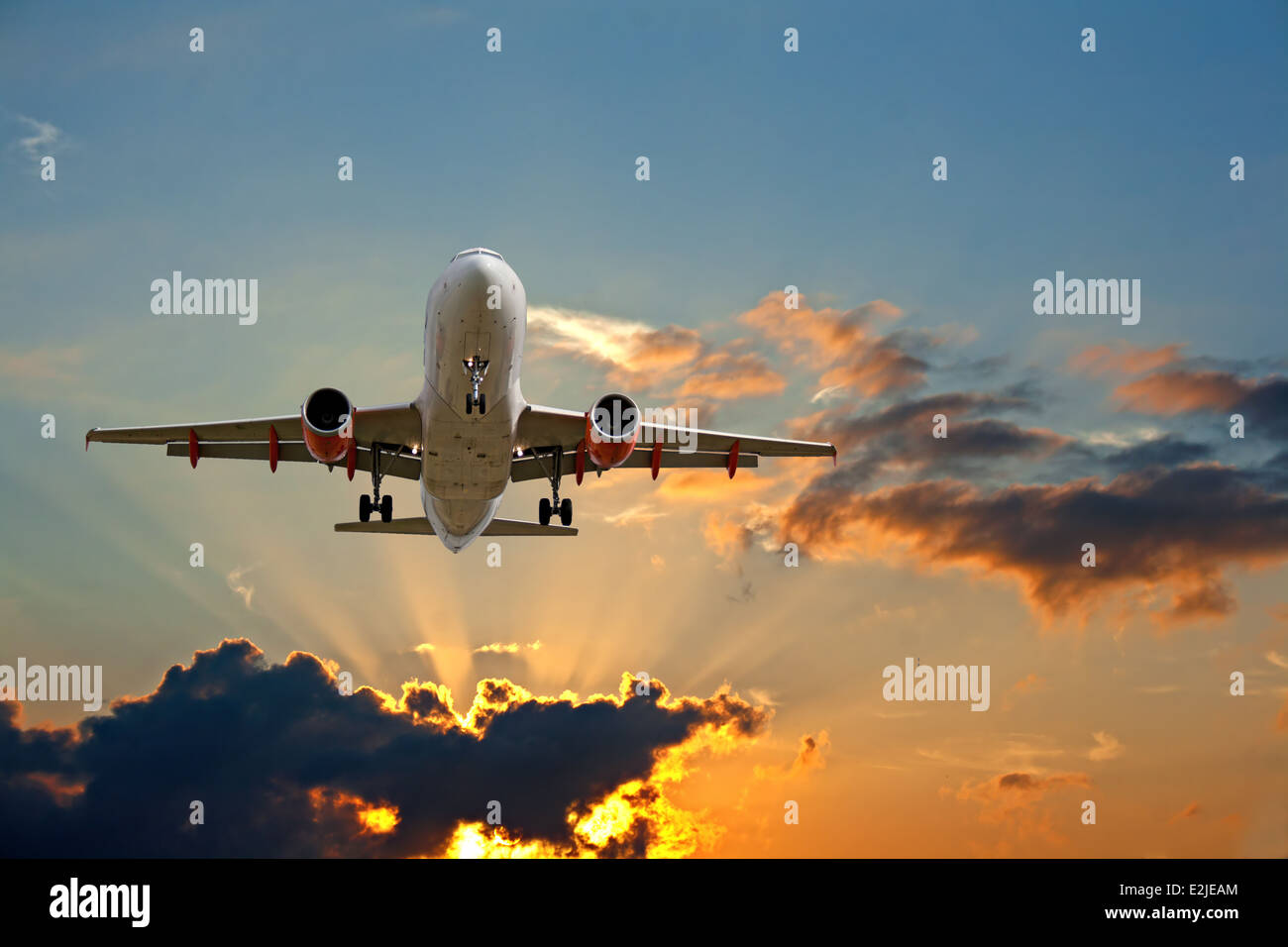 Passenger jet sunset sky hi-res stock photography and images - Alamy