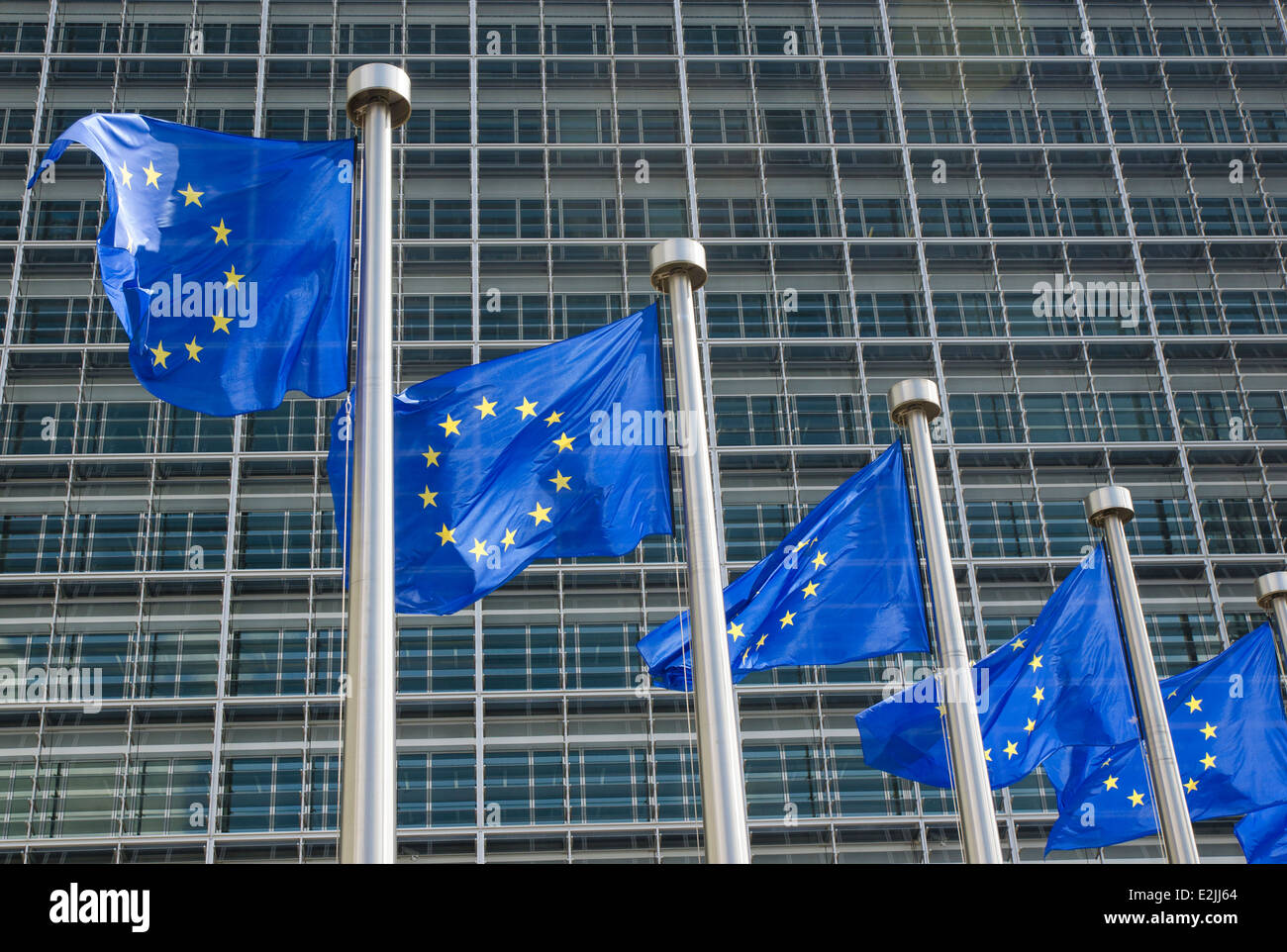 EU flags in front of European Commission in Brussels Stock Photo