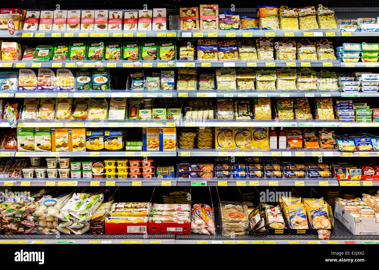 Shelf with food in a supermarket. Refrigerated, ready to eat meals