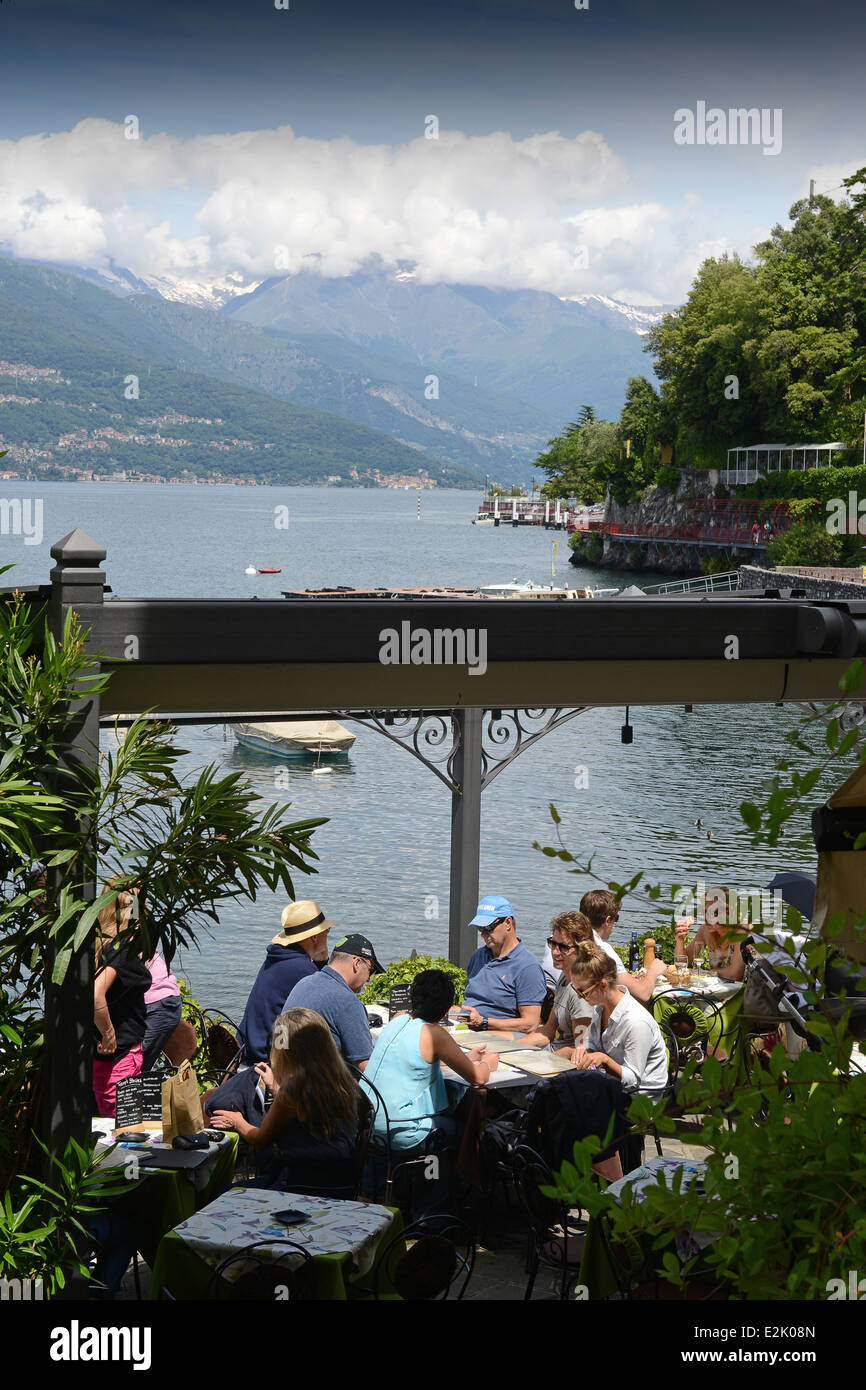 Lakeside dining at restaurant at Varenna on Lake Como Italy Stock Photo