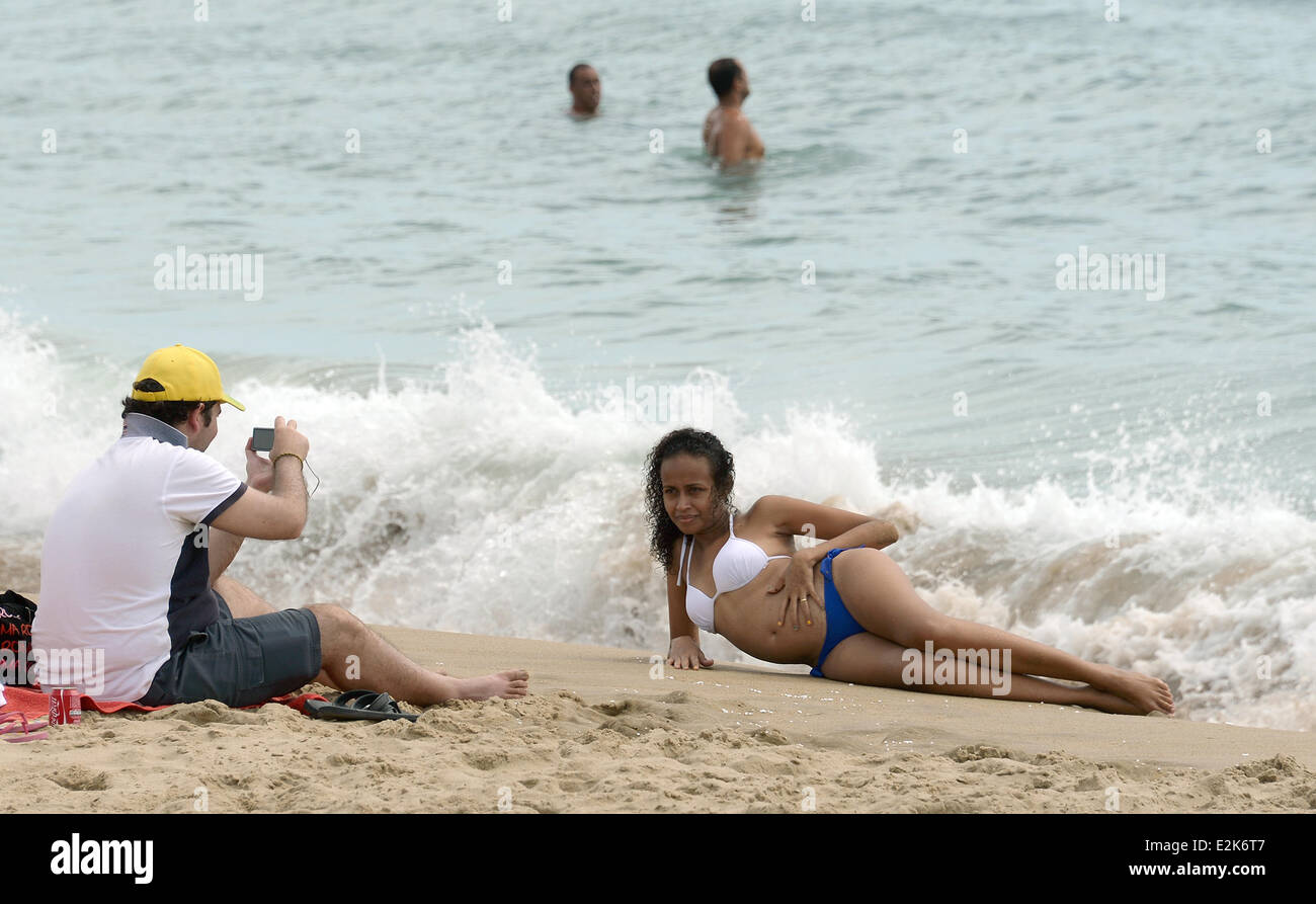 Fortaleza, Brazil. 20th June, 2014. A girl poses for pictures at the beach  in Fortaleza, Brazil, 20 June 2014. The FIFA World Cup will take place in  Brazil from 12 June to