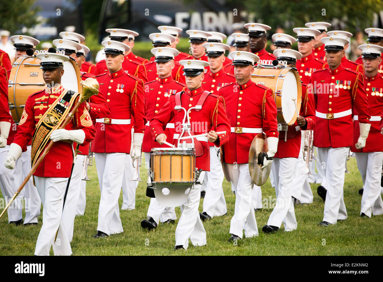 ARLINGTON, Virginia — The United States Marine Drum and Bugle Corps, known as the Commandant's Own, performs at the Sunset Parade at the Iwo Jima Memorial in Arlington, Virginia, next to Arlington National Cemetery. Stock Photo