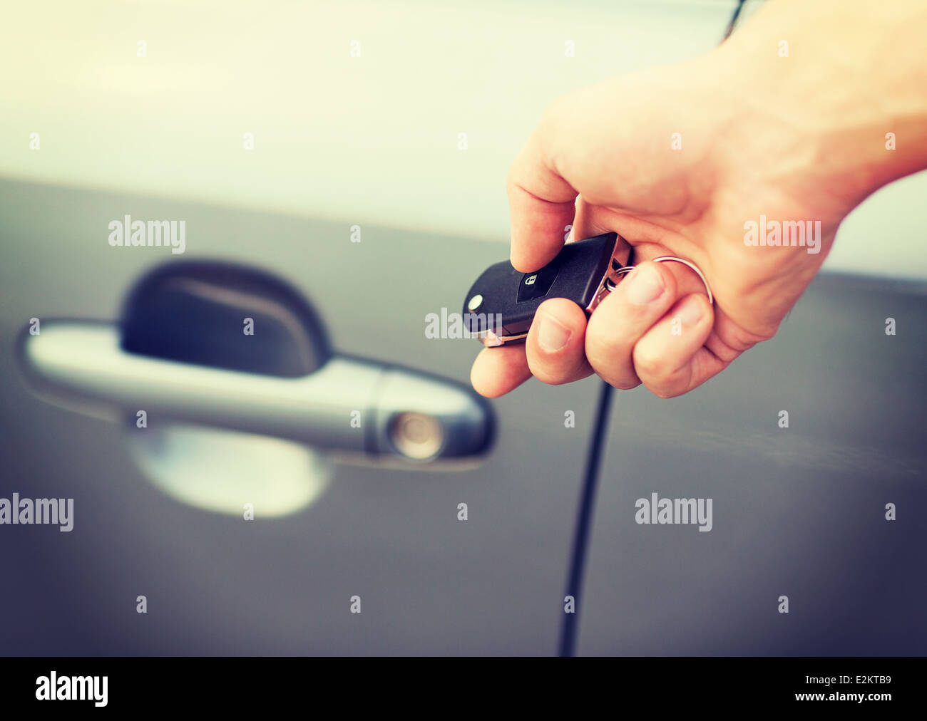 man with car key outside Stock Photo