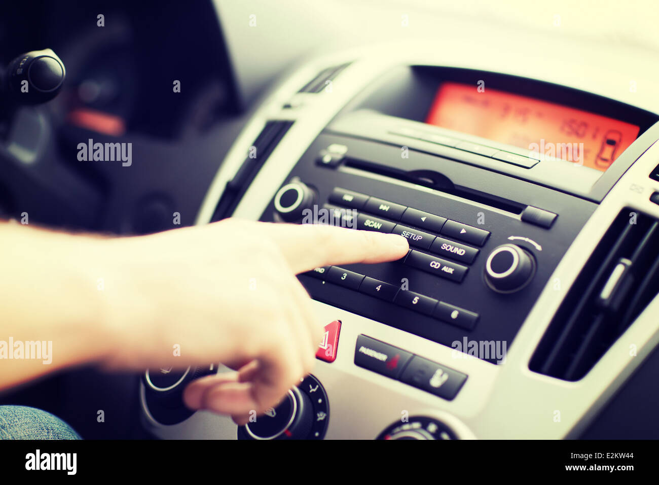 man using car audio stereo system Stock Photo